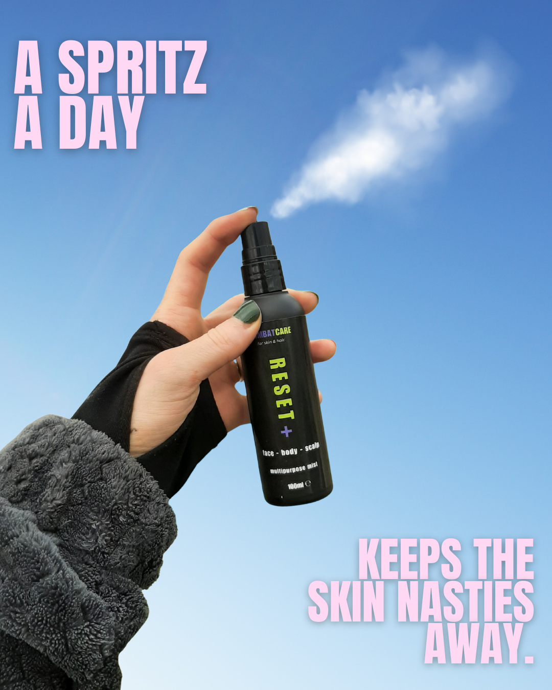 Hand holding a spray bottle labeled 'RESET+' against a blue sky with text about daily use for skin issues.